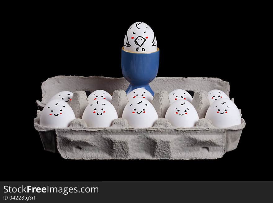 Happy eggs with smiley faces in eggshell with a boss over their head