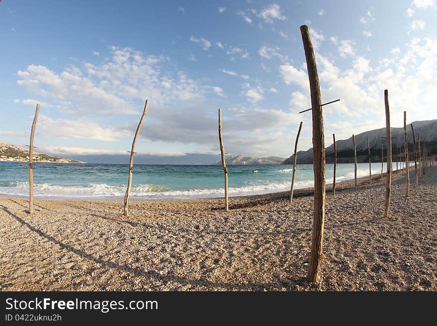 Waves sweep across the beach. Waves sweep across the beach