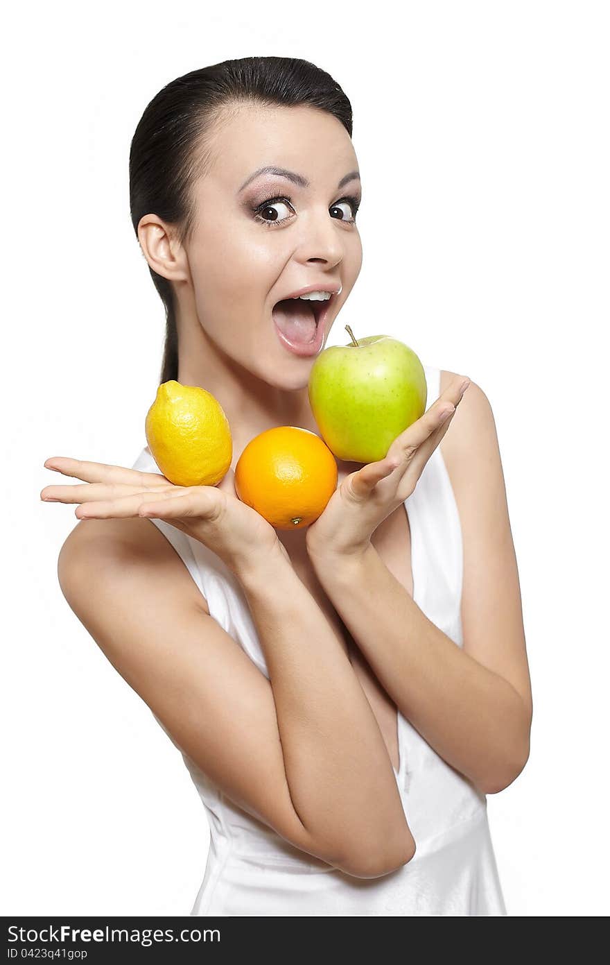 Portrait of beautiful happy smiling girl with fruits lemon and green apple and orange isolated on white. Portrait of beautiful happy smiling girl with fruits lemon and green apple and orange isolated on white