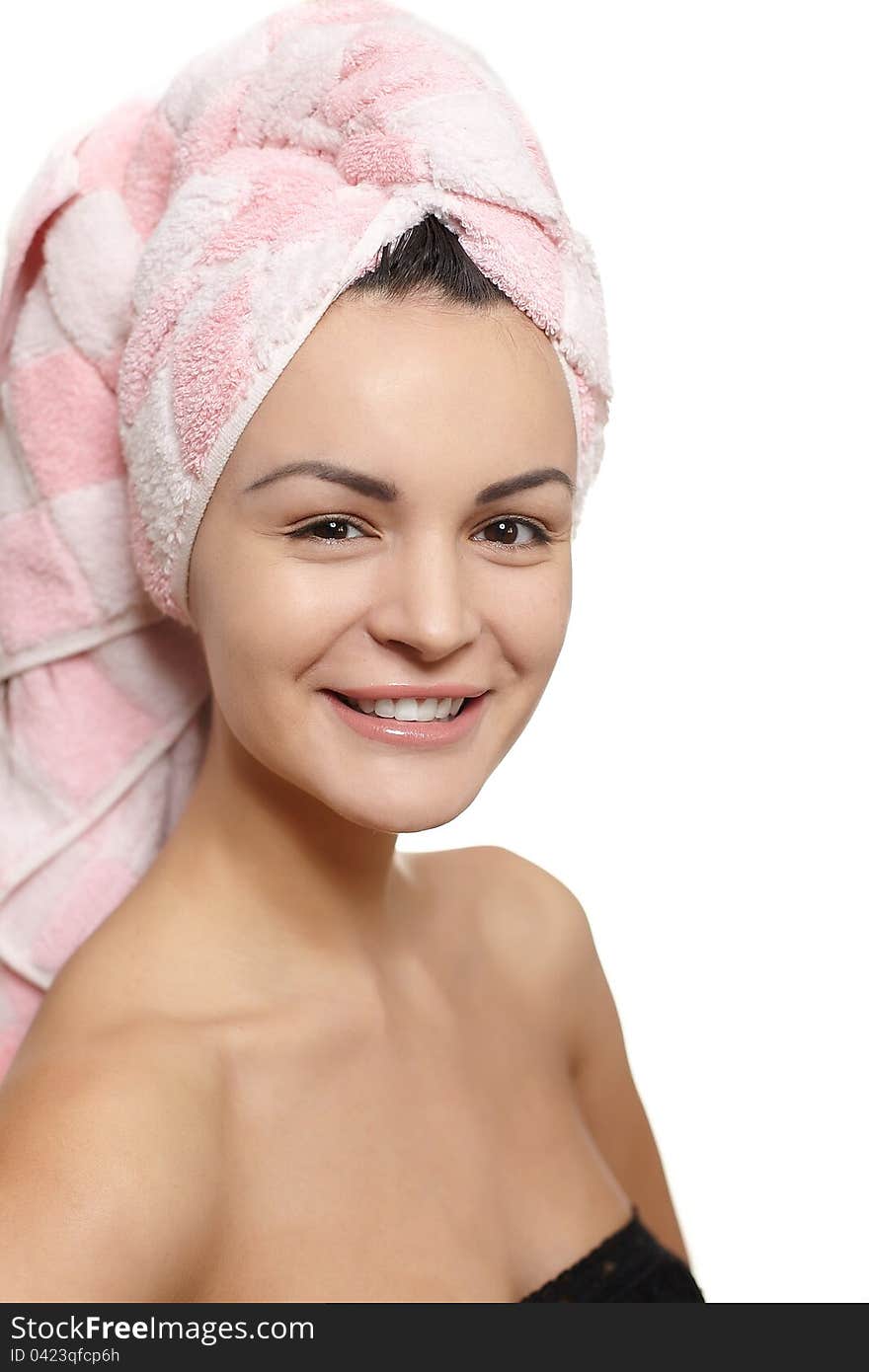 Portrait of beautiful caucasian smiling woman in towel on the head isolated on white studio. Portrait of beautiful caucasian smiling woman in towel on the head isolated on white studio