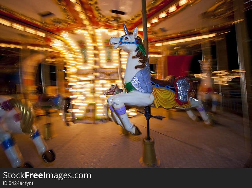 Carousel in an amusement park. Carousel in an amusement park.