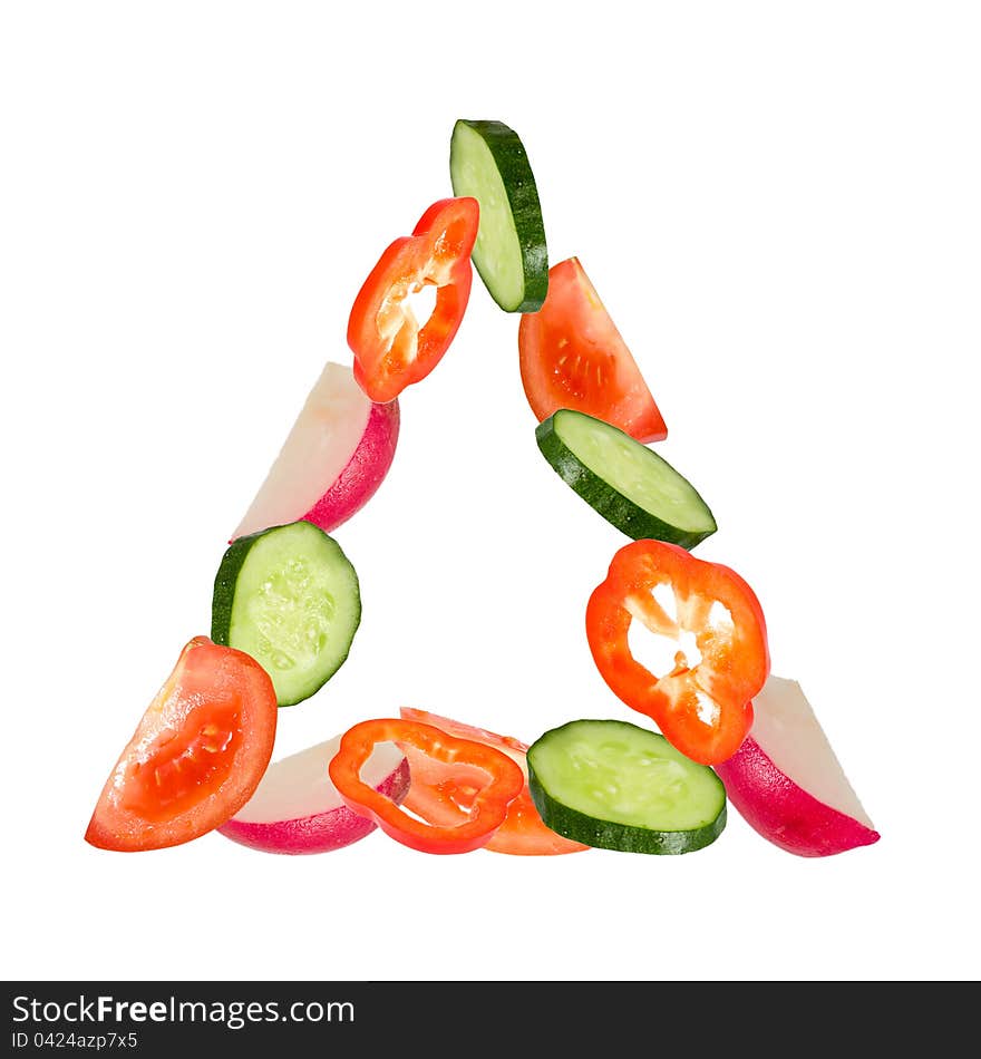 The cut vegetables lie in form triangle. The cut vegetables lie in form triangle