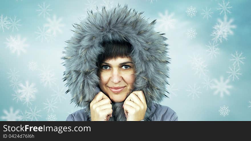 Young beautiful woman in winter hat