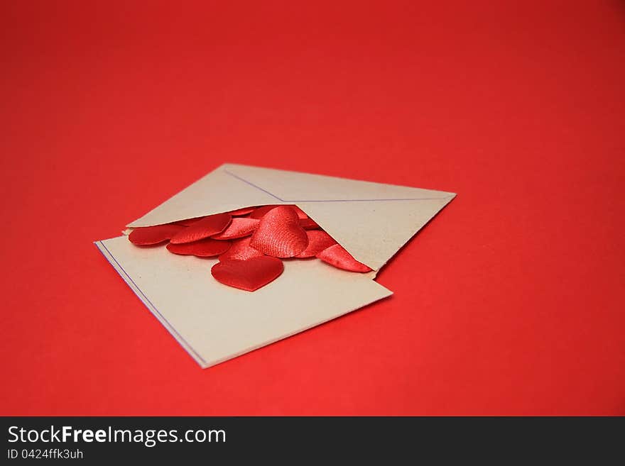 Blanc envelope with red heart on red. Blanc envelope with red heart on red