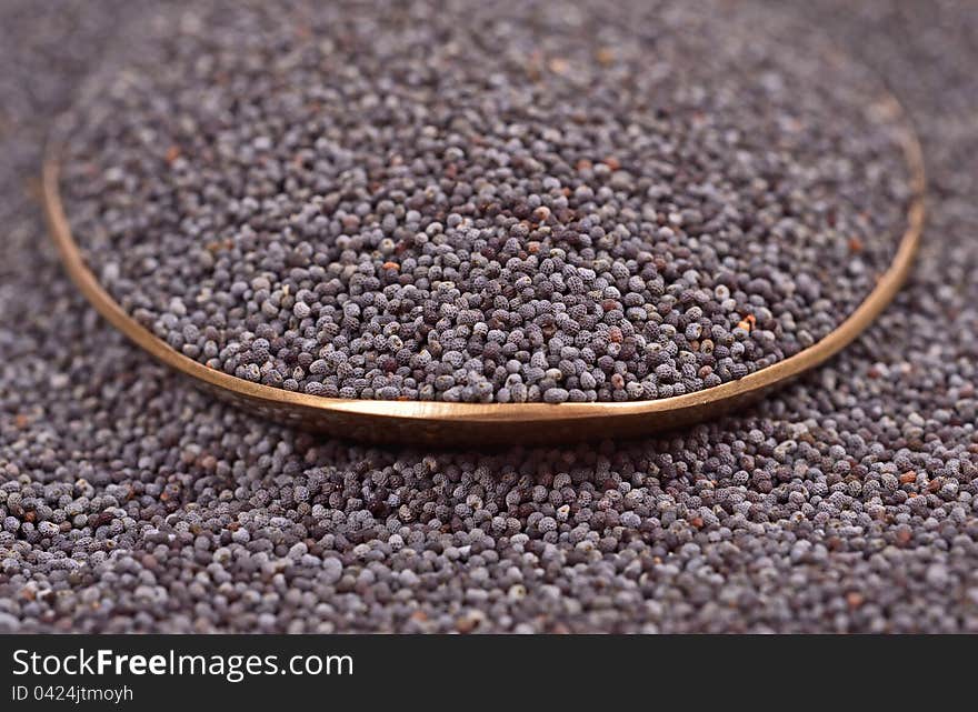 Seeds of most species of poppies used as a spice in baking and confectionery. Seeds of most species of poppies used as a spice in baking and confectionery