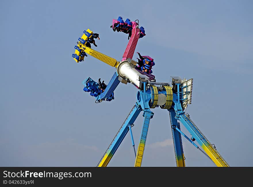 A merry-go-round in action in a fun house.