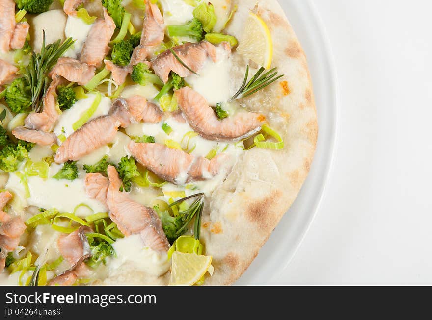 White pizza with lemon and salmon