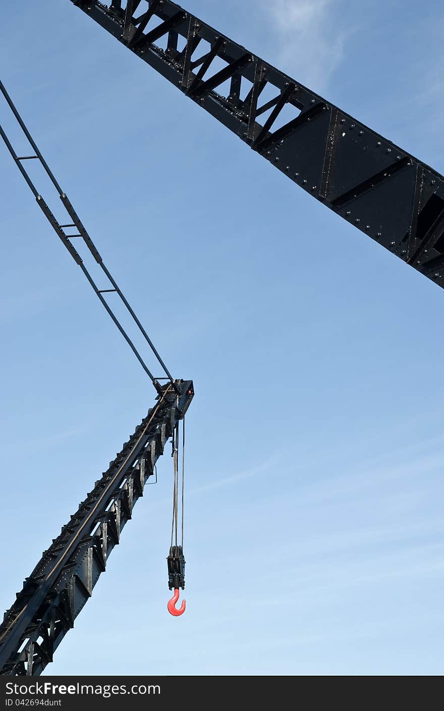 Port crane in Lisbon marina, Portugal.