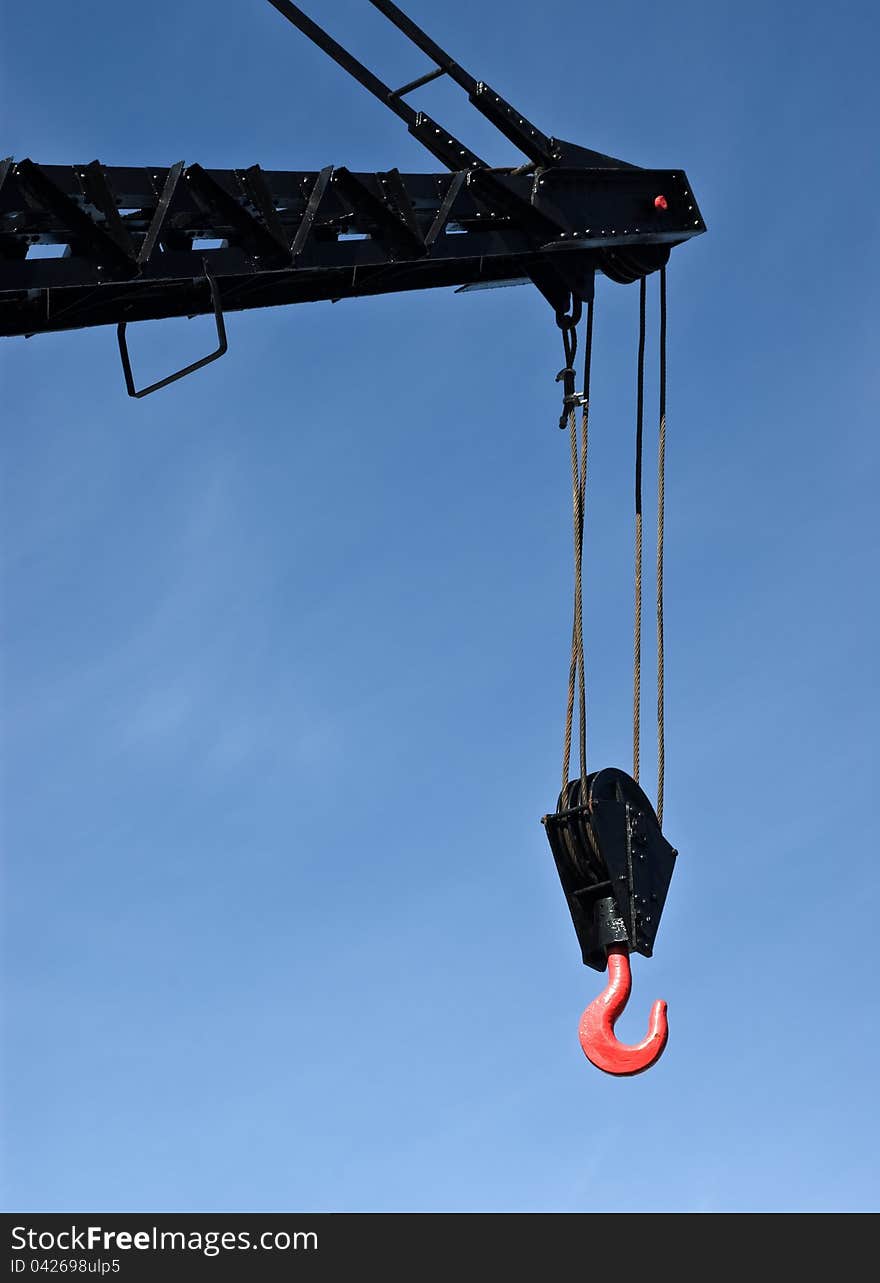 Port crane in Lisbon marina, Portugal.