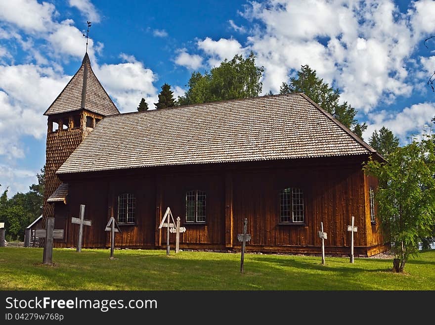 The old stave church at Sarna, Sweden. Most of it dates back to 1684 with some elements of Celtic art. Note the fencing, which is characteristic of Sweden.