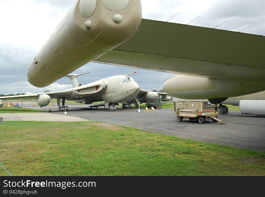 Handley Page Victor V-bomber preserved at Elvington airfield in Yorkshire viewed under the wing of a BAe Nimrod AEW aircraft. Handley Page Victor V-bomber preserved at Elvington airfield in Yorkshire viewed under the wing of a BAe Nimrod AEW aircraft.