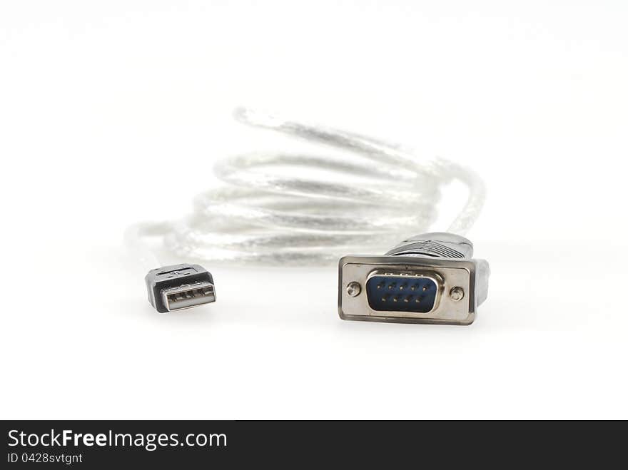 Isolated USB to serial cable on white background. Isolated USB to serial cable on white background