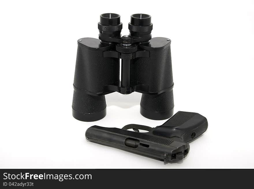 Binoculars and gun