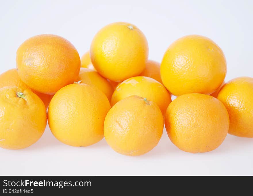 Lots of oranges on white. Lots of oranges on white