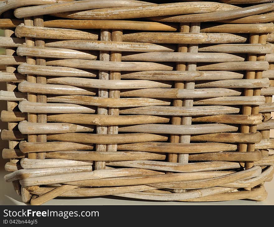 Wicker basket on the grill pot in the summer sun. Wicker basket on the grill pot in the summer sun.