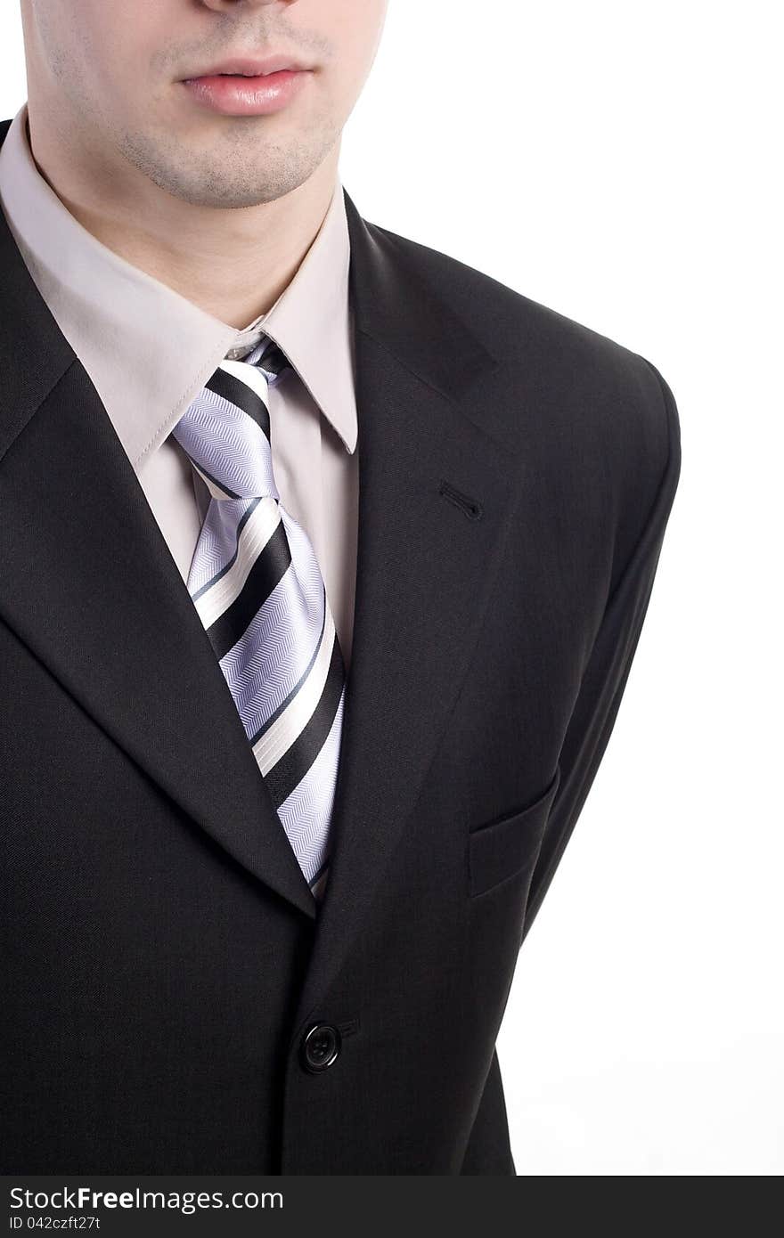 Elegant young businessman with clothes on. Elegant young businessman with clothes on