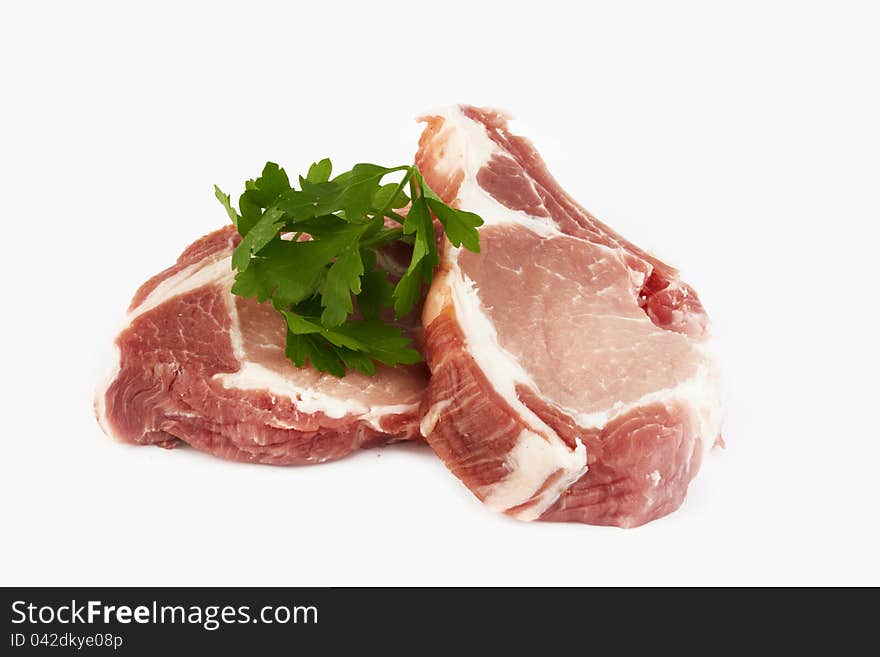 Meat raw pork cutlet on a white background