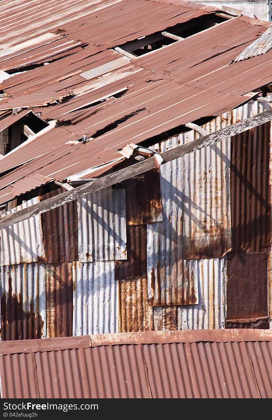 Disrepair corrugated iron warehouse in thailand. Disrepair corrugated iron warehouse in thailand