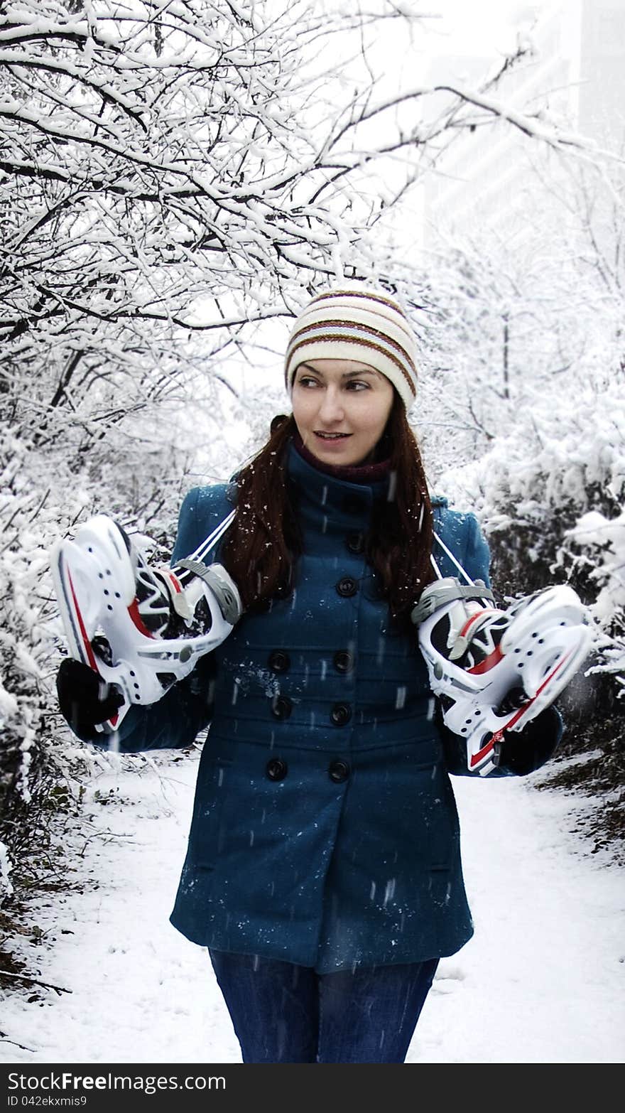 Girl with ice skates on a winter day. Girl with ice skates on a winter day