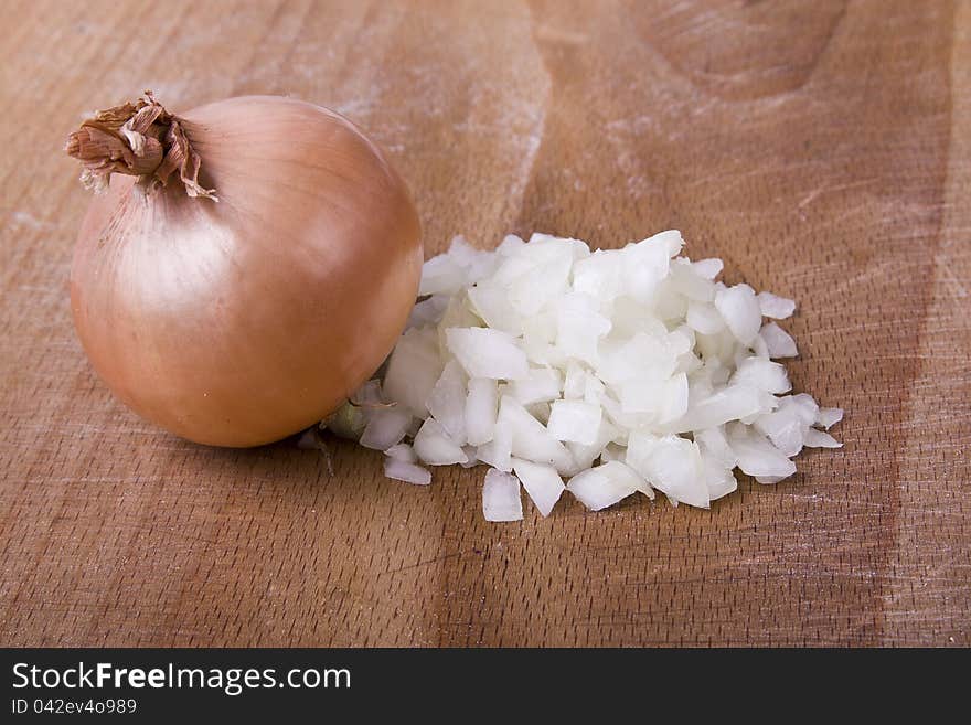 Onions on a wooden cutting board