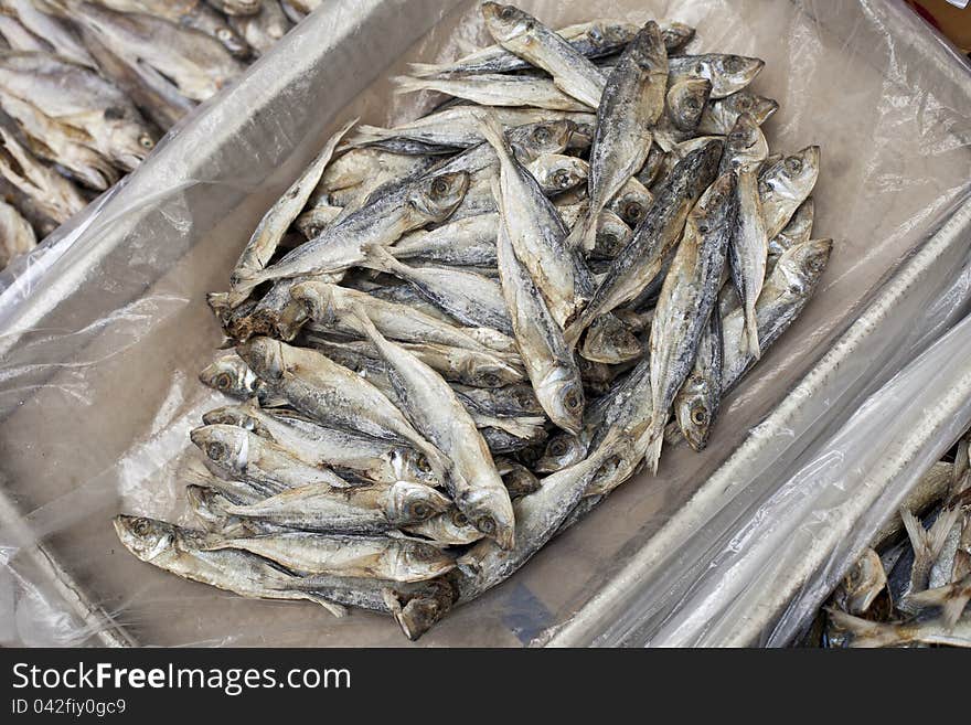 Dried fish in a box at a market