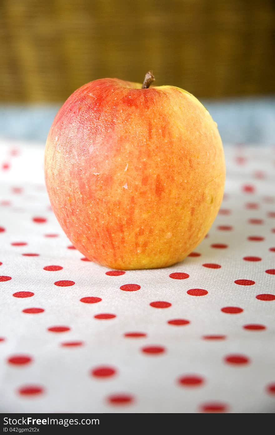 Close up apple put on polka dots table