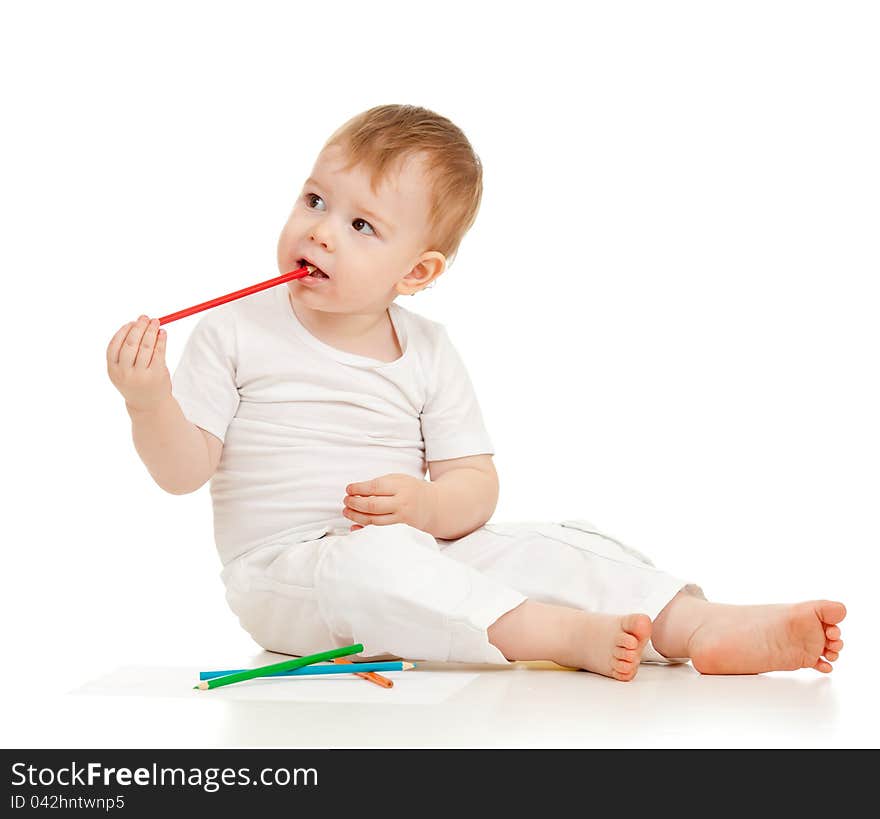 Funny baby boy drawing with color pencils. Funny baby boy drawing with color pencils