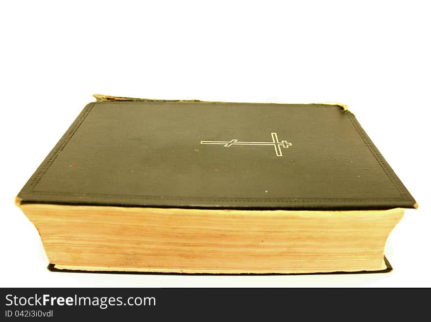 An old bible on a white background