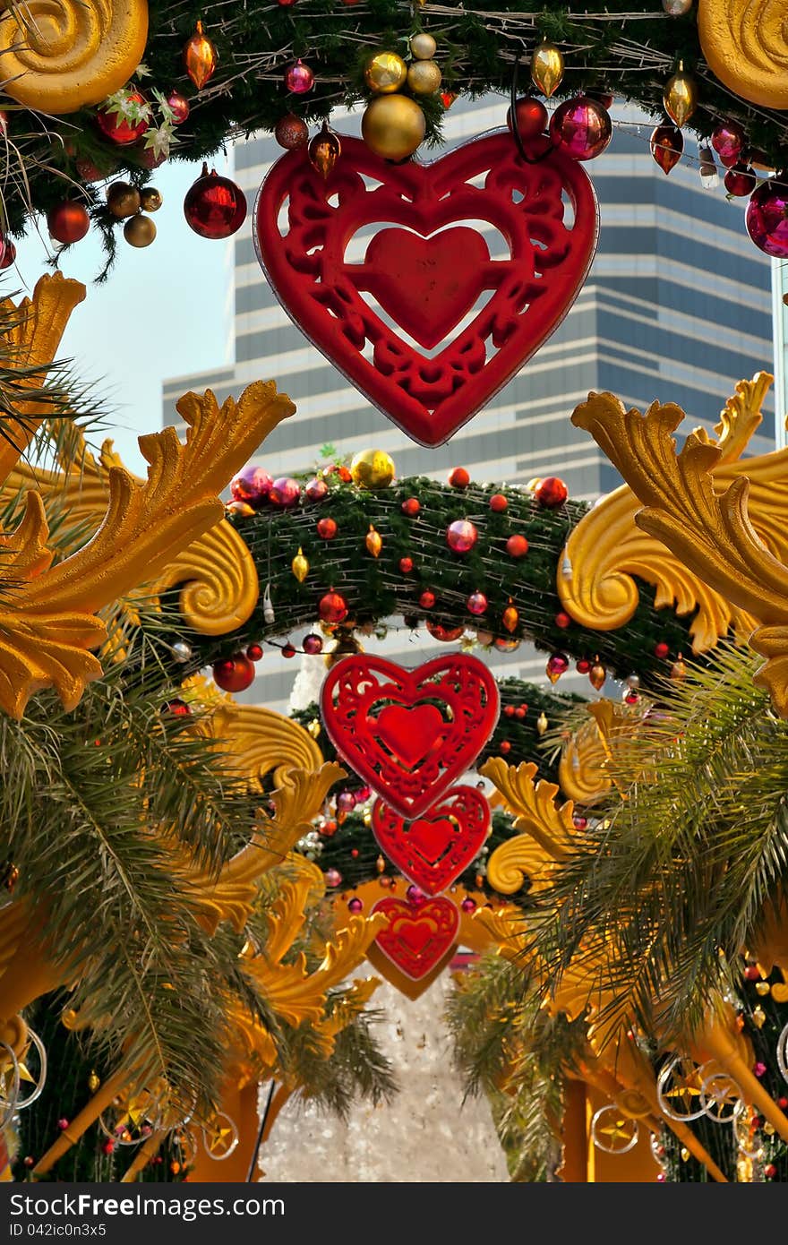 Outdoor Christmas decorations, a corridor of pine branches and hearts