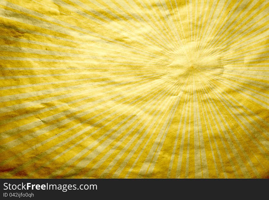 It is a texture of an old paper in a yellow strip. A background in style of a retro