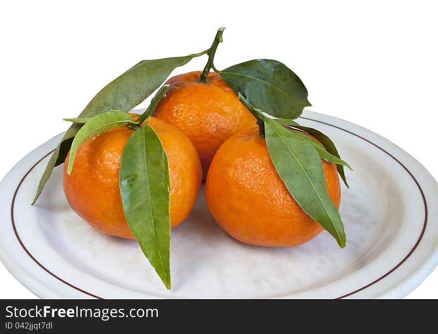 Ripe mandarins on plate in isolated on white. Ripe mandarins on plate in isolated on white