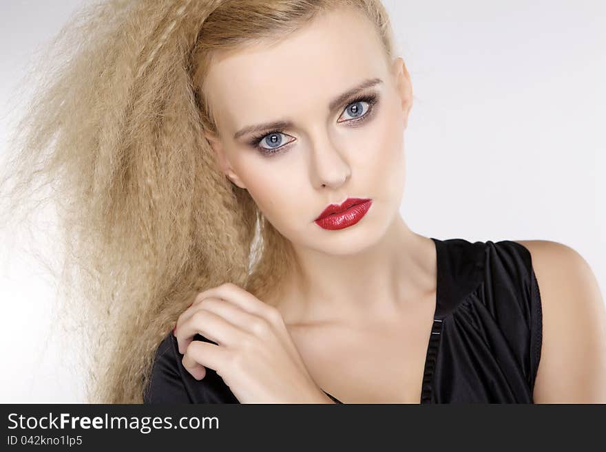 Young pretty woman with beautiful blond hairs