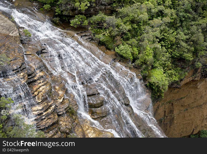 Australian landscape with waterfall in mountains