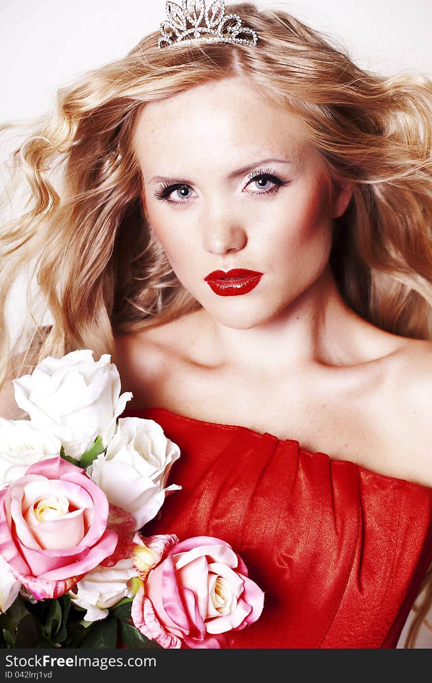 Beautiful young lady wearing red rose dress