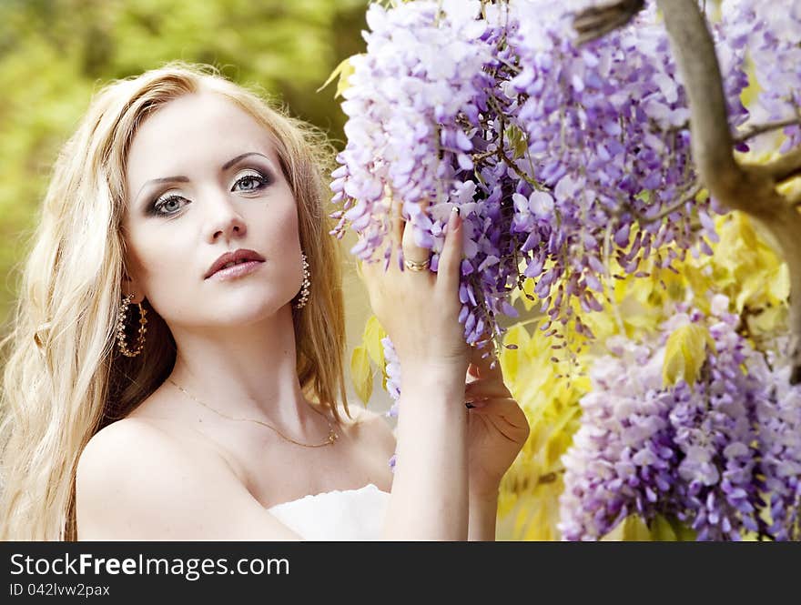 Beautiful bride with white hair walking in the park. Beautiful bride with white hair walking in the park