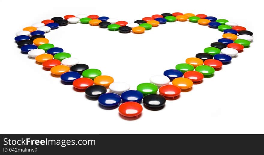 Heart lined with colorful magnets. Heart lined with colorful magnets