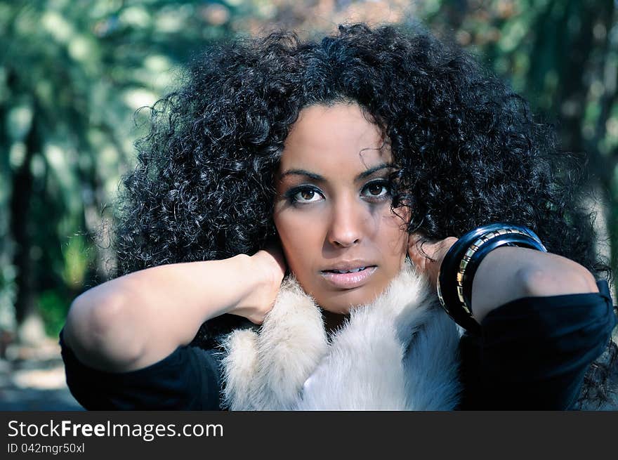 Portrait of a young black woman in the park