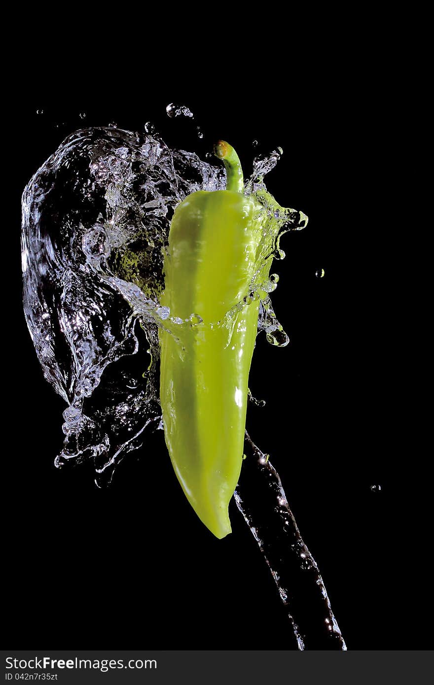 Green Pepper Splashed By Water