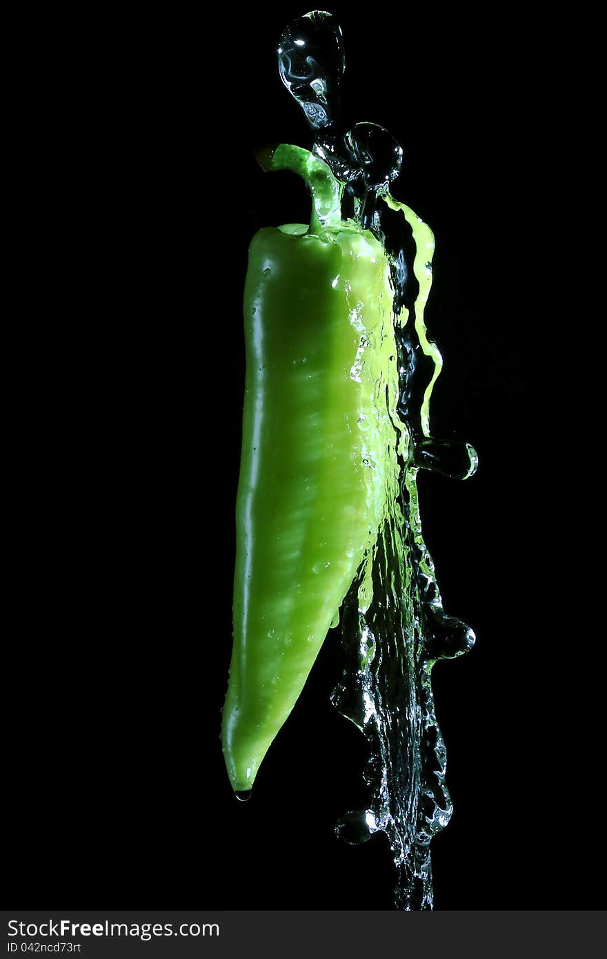 Green Pepper Splashed By Water