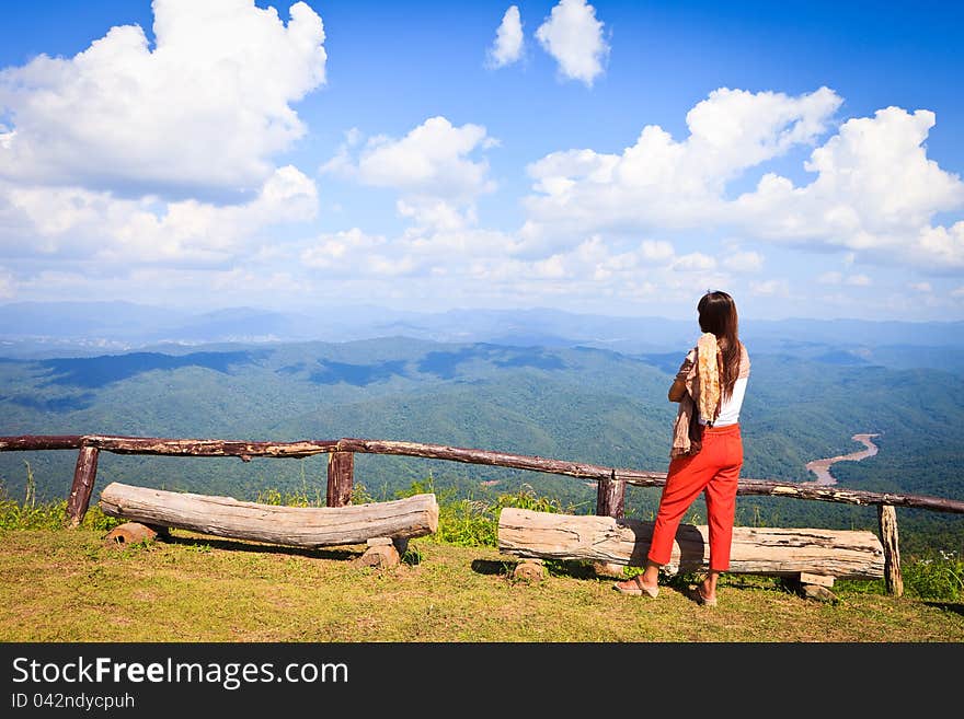 Woman see mountain with blue sky