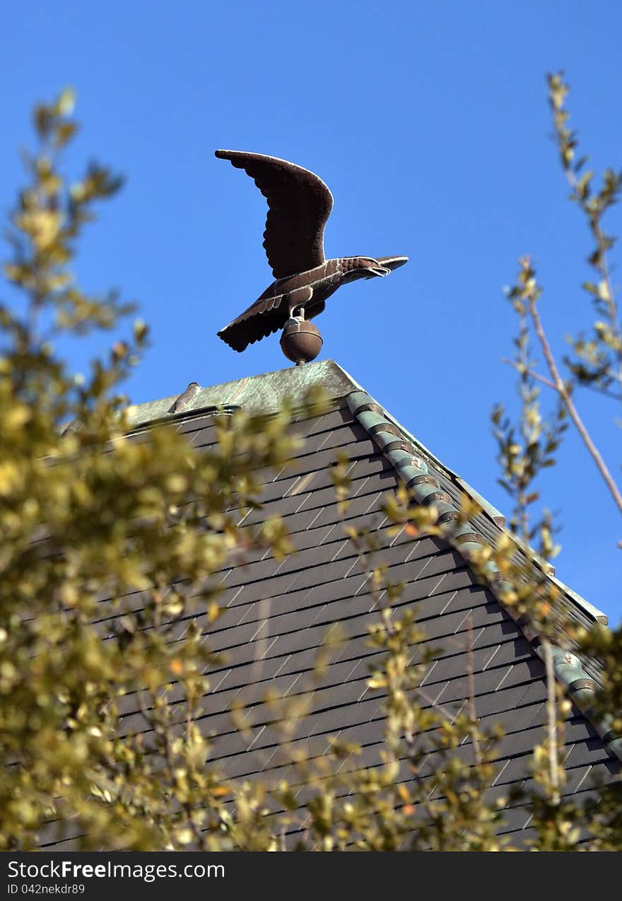 Eagle weather vane on the Ellis County Courthouse in Waxahachie, Texas. Eagle weather vane on the Ellis County Courthouse in Waxahachie, Texas