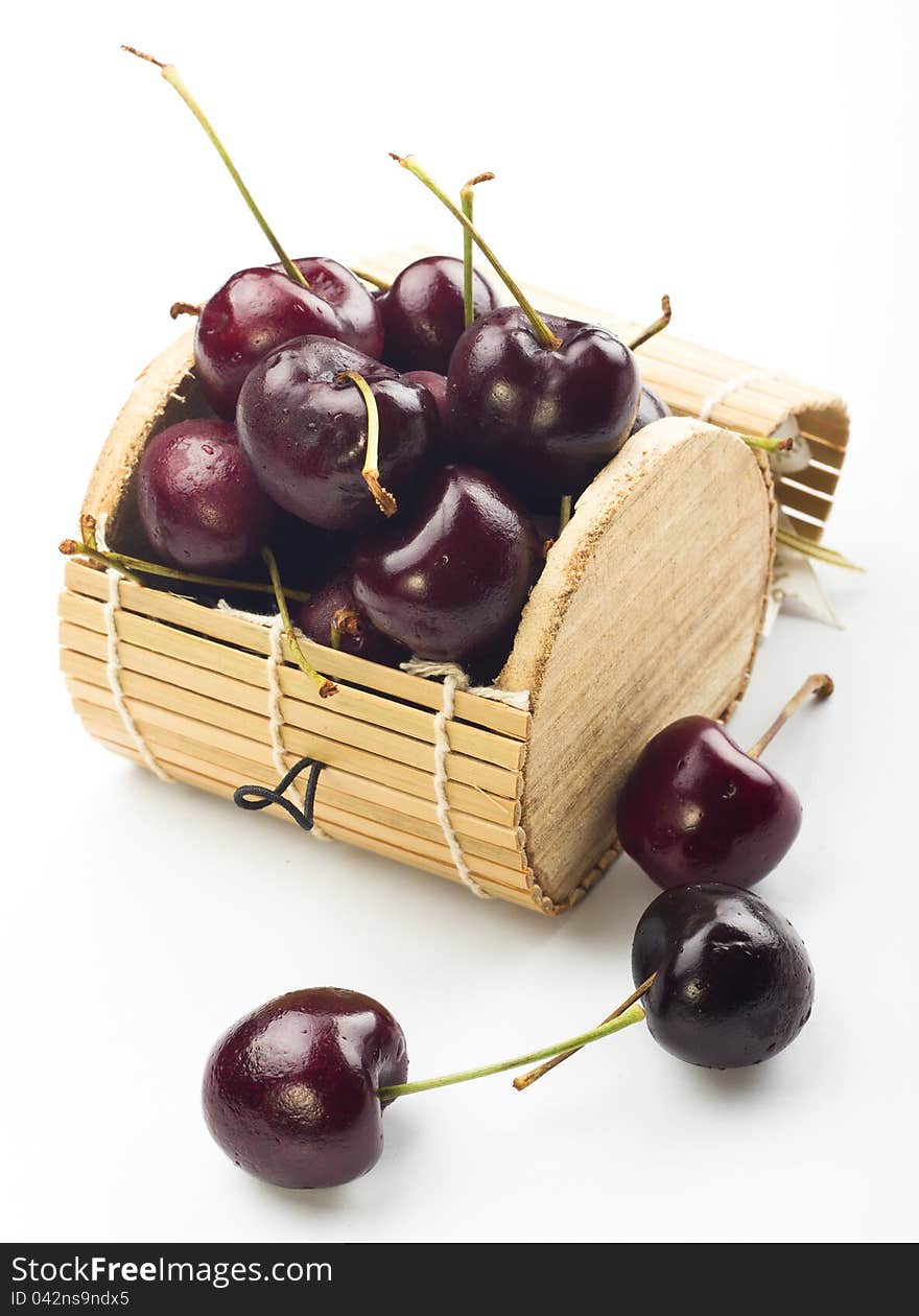 Ripe fresh cherry on white background