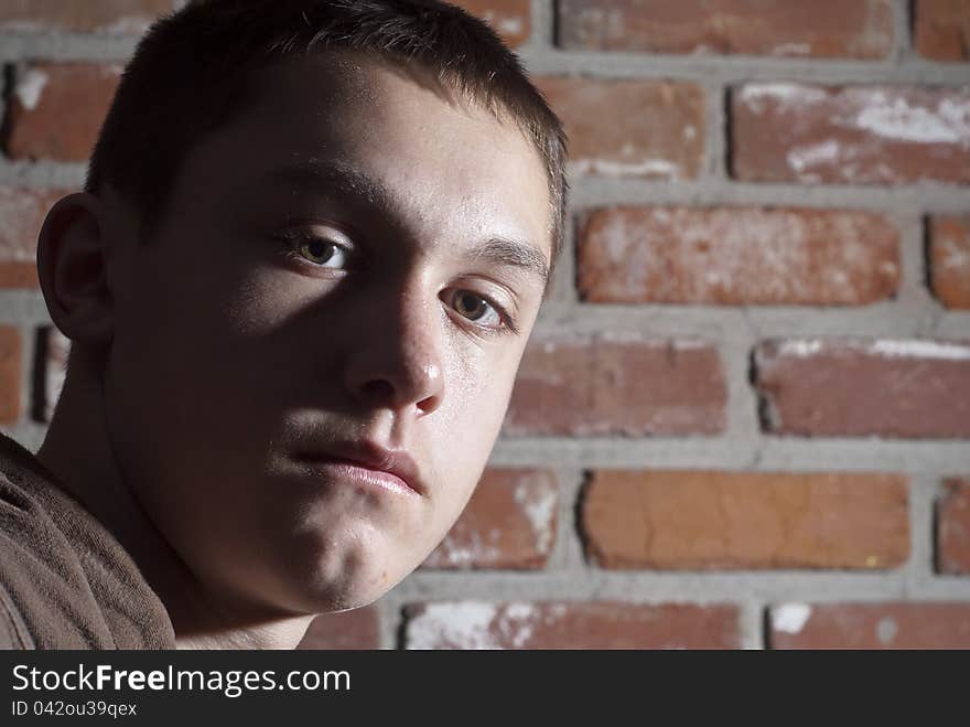 Boy looking serious at camera