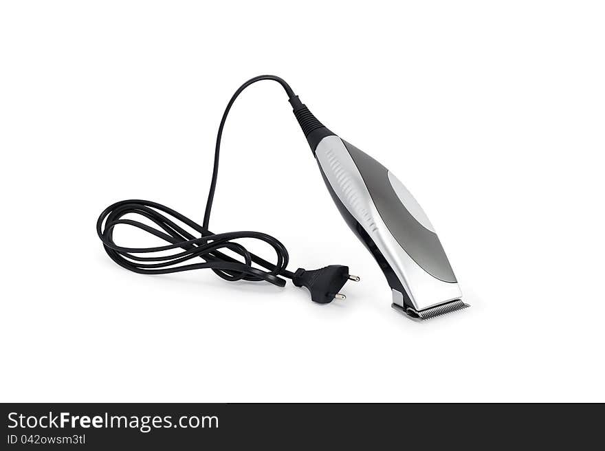 Modern electric hair clipper with cable on white background. Clipping path is included