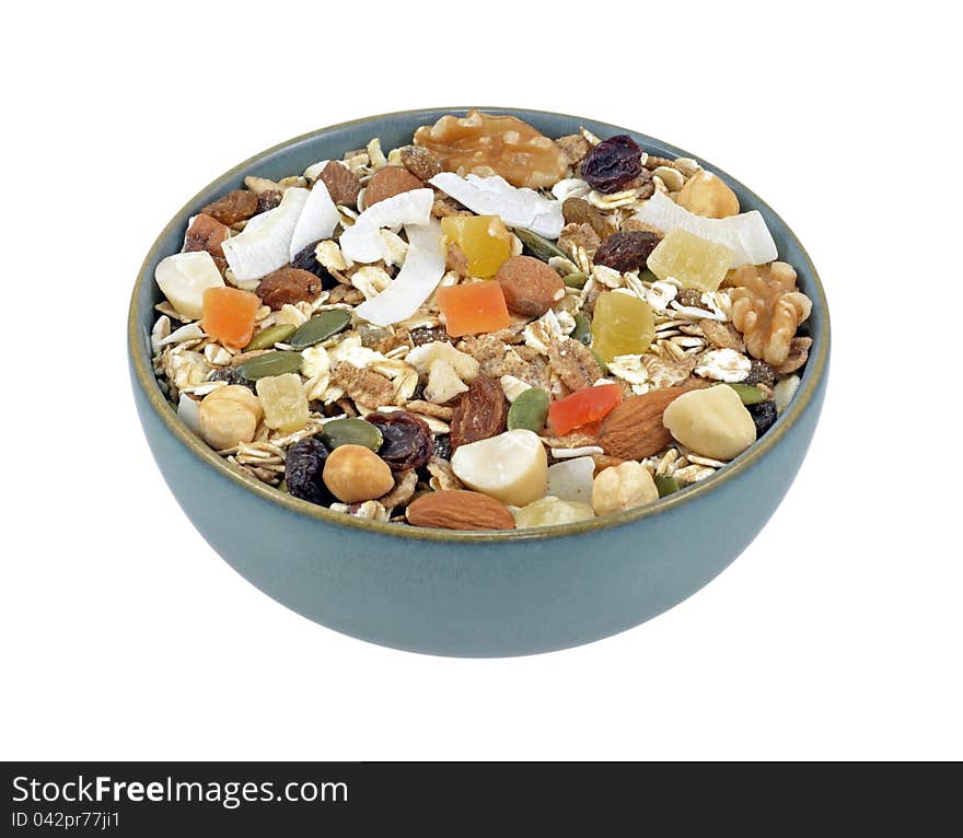 Bowl of muesli with fruit, isolated on white background