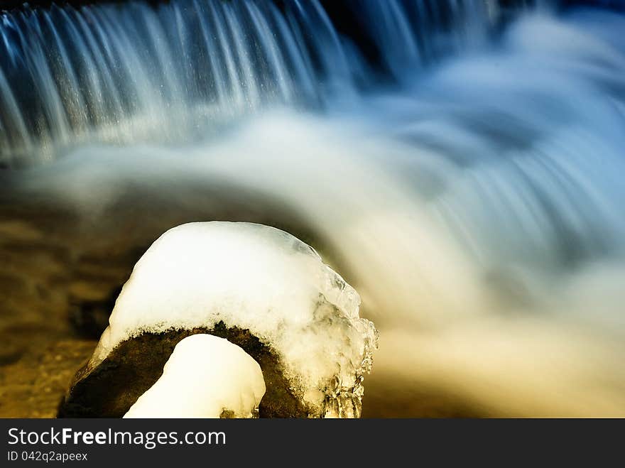 Fresh water with ice in the park