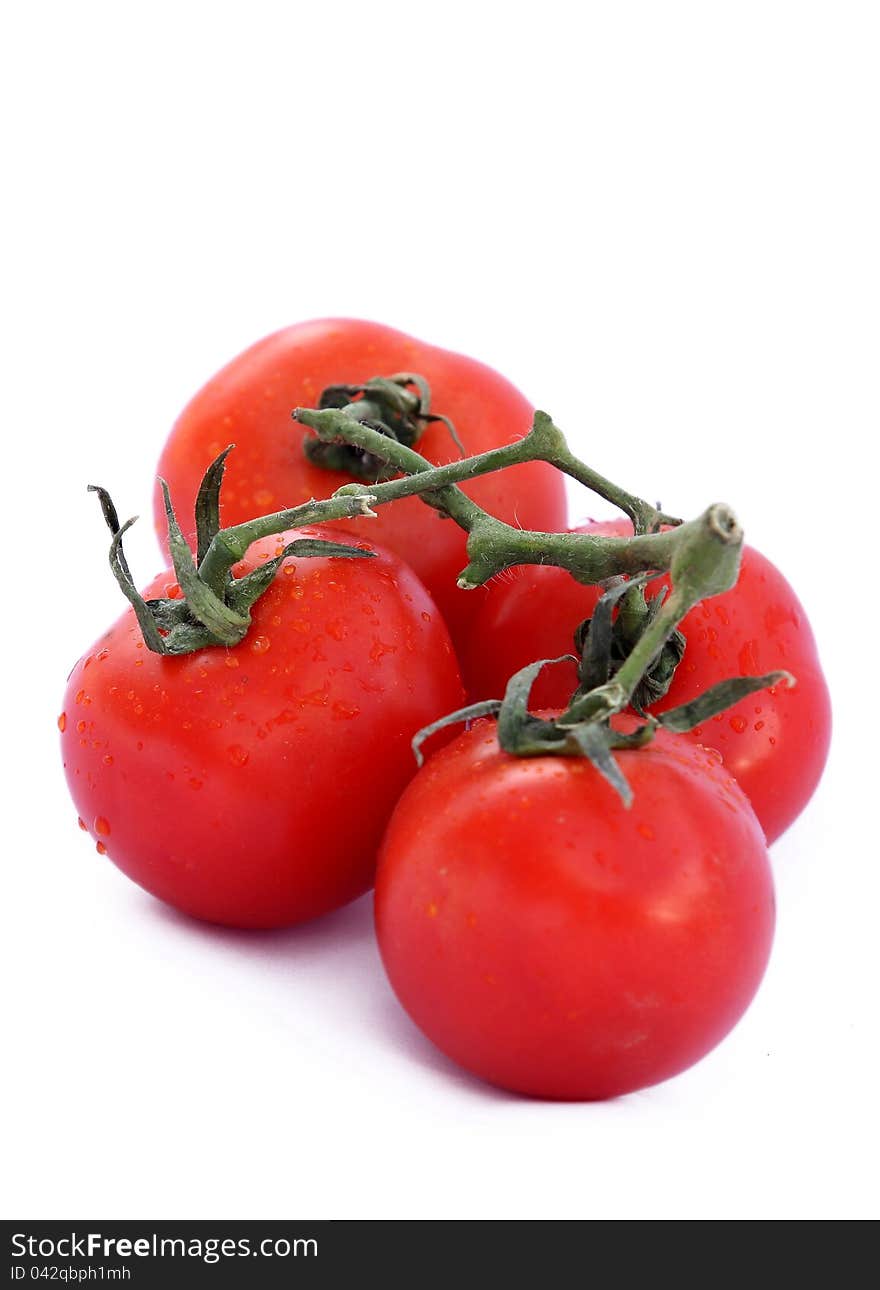 Frash rad tomatoes isolated on white background