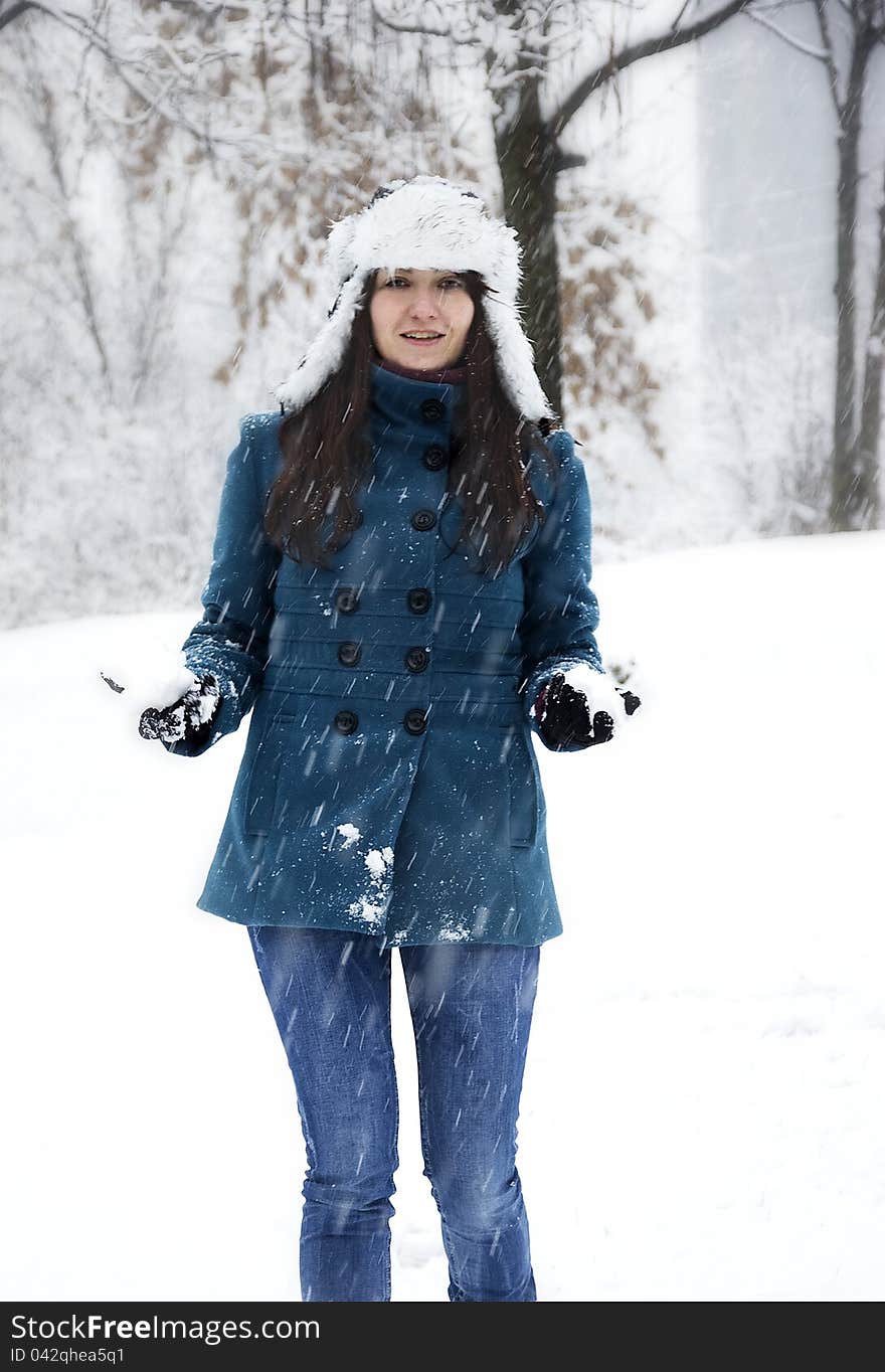 Woman playing with snow