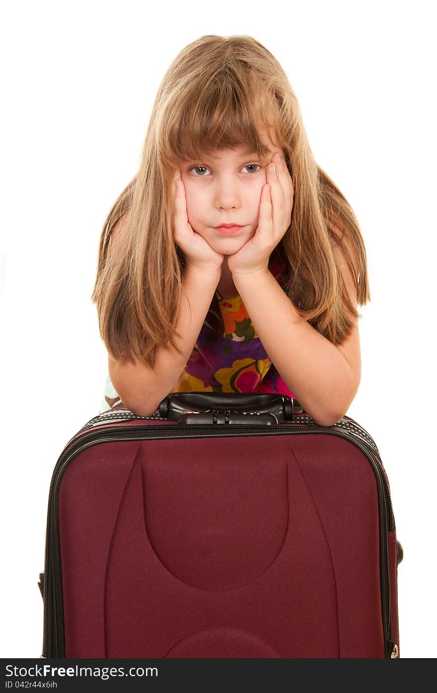 Beautiful girl with a suitcase, isolated on white