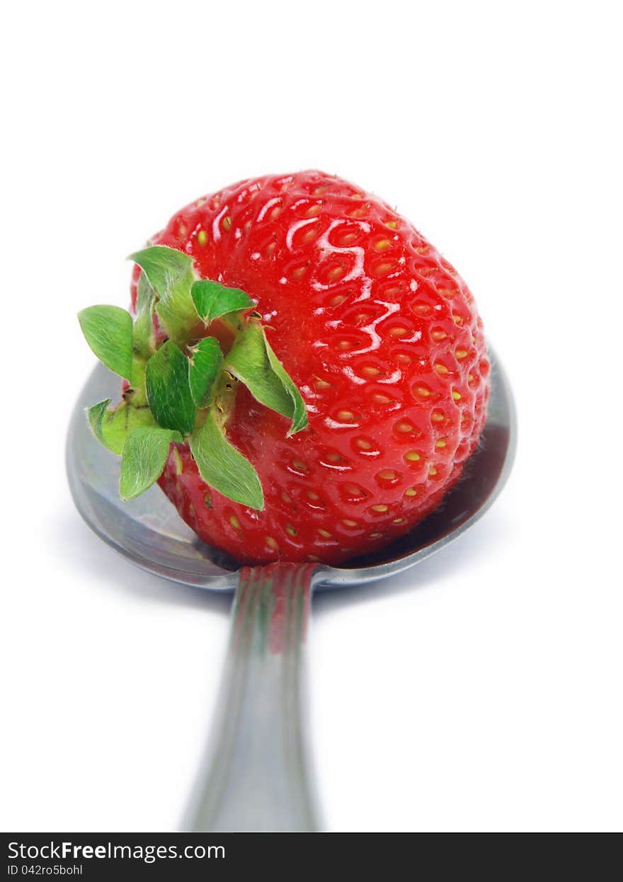 Strawberry on spoon